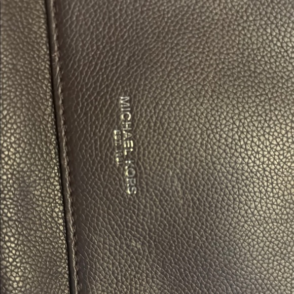 Michael Kors Black Messenger Bag with Flap Closure